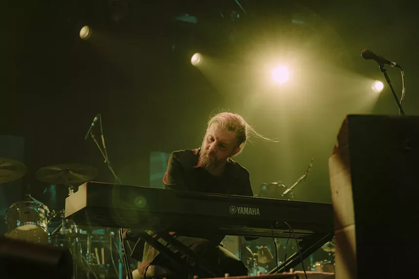 A photo of The Black Heart Procession's keyboard player.