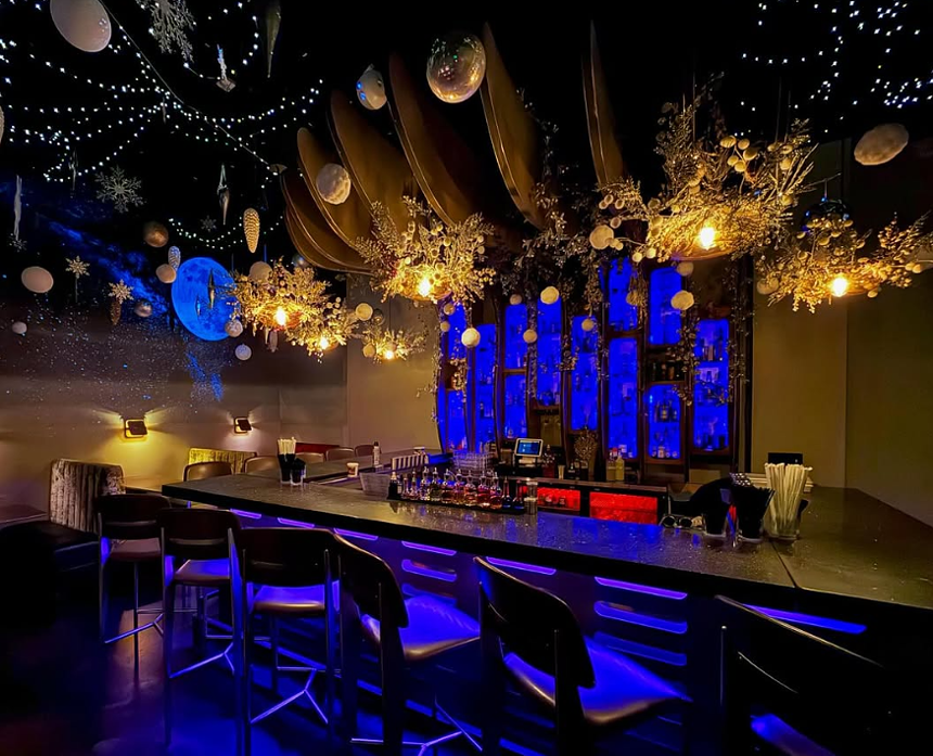 bar decored with holiday lights