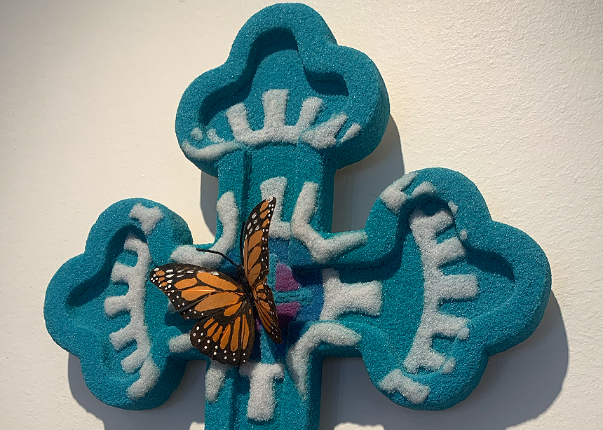 a decorated wooden cross