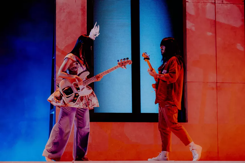 khruangbin performing at red rocks