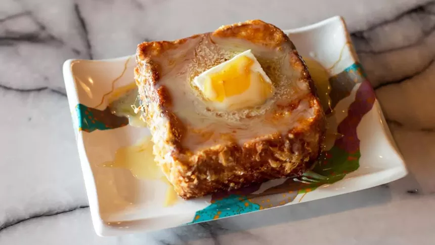 slice of french toast with melted butter