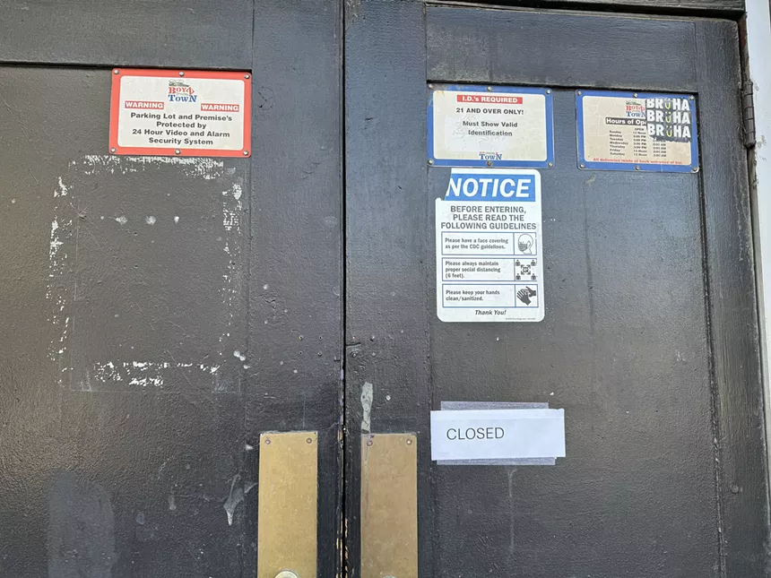 Business doors with "closed" sign