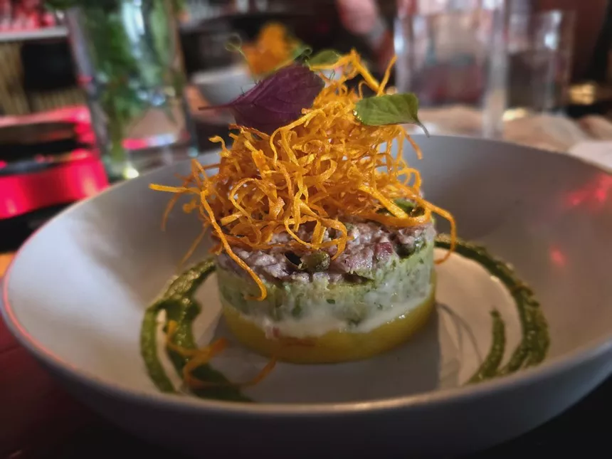 Tenderloin tartare over potato causa and ají verde