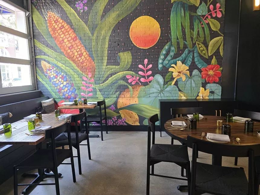 bright mural inside a dining room