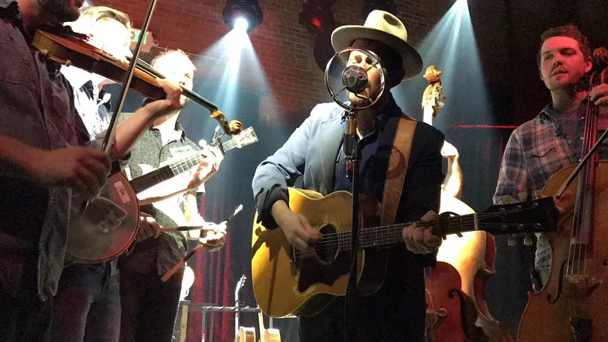 Gregory Alan Isakov on stage at the Armory