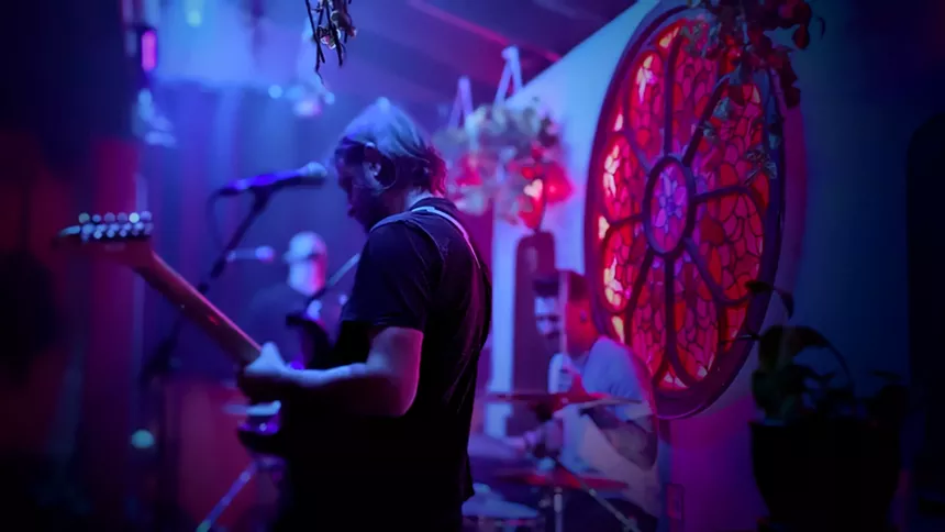 band performing in a venue