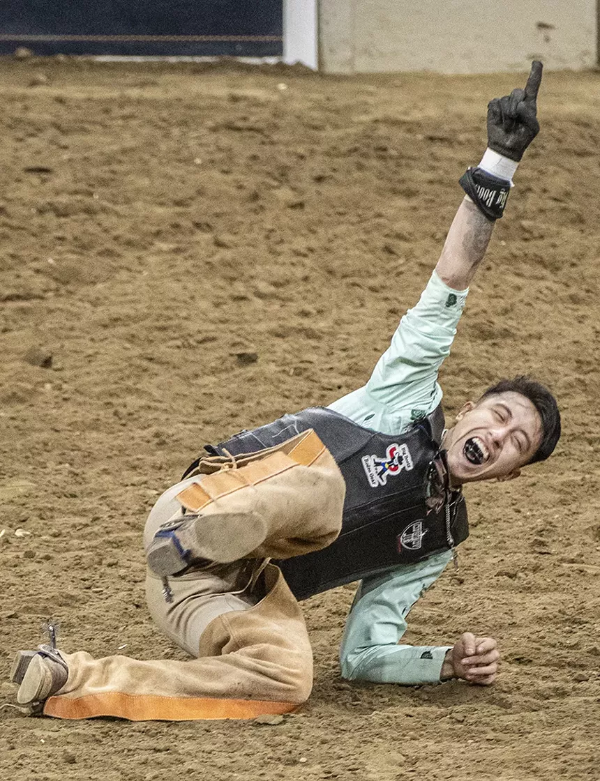 rodeo rider in dust