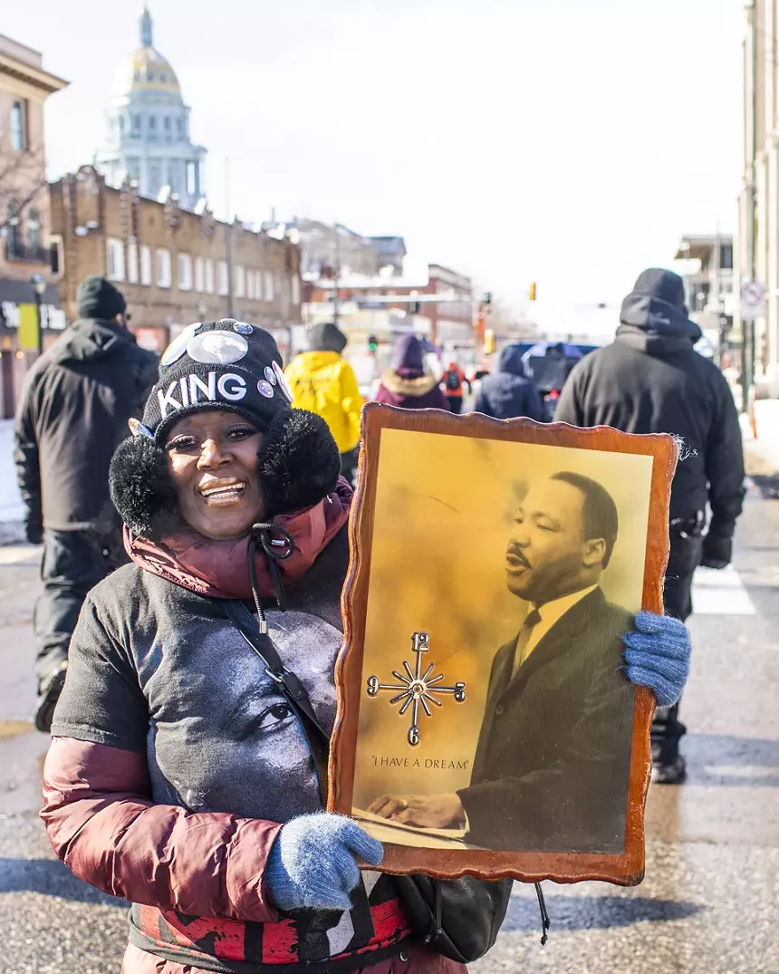woman with picture of king
