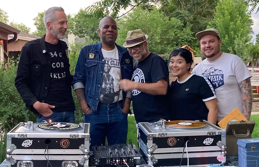 The five members of Denver Vintage Reggae Society standing together