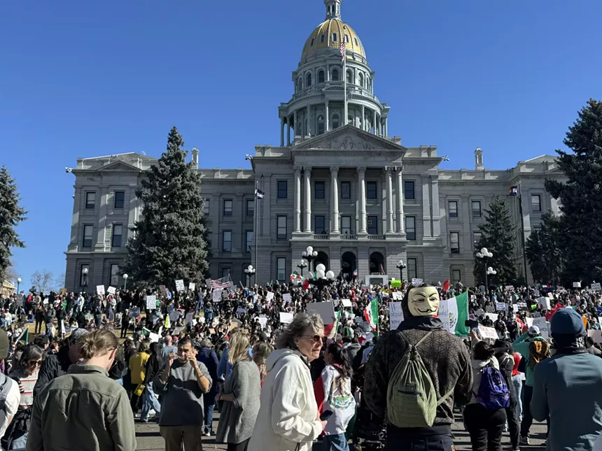 People protest at the Capitol.