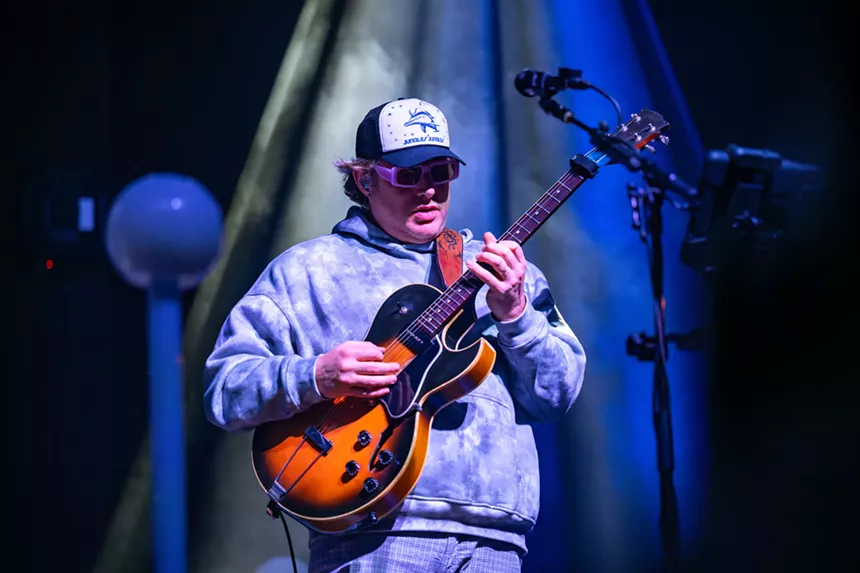 Jon "Barber" Gutwillig playing guitar