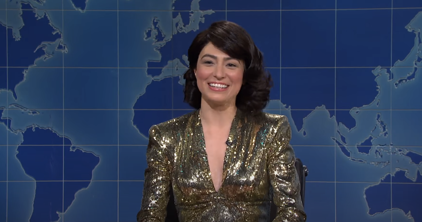 A woman in a sparkling top