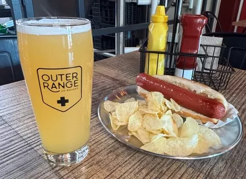 a beer and a hot dog