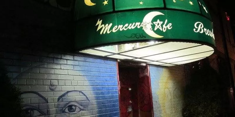 building with Mercury logo on awning