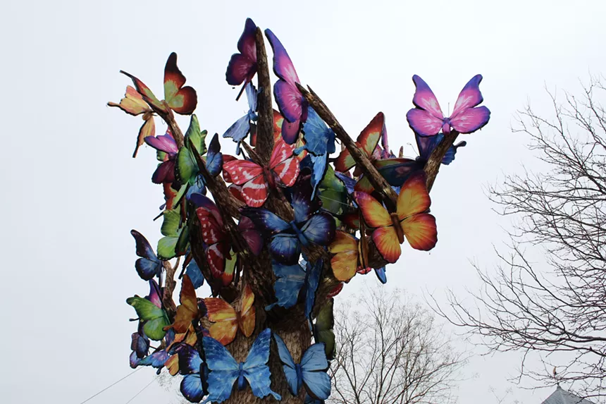 A tree made of colorful butterflies