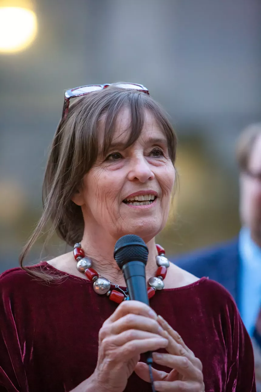 A woman with a microphone
