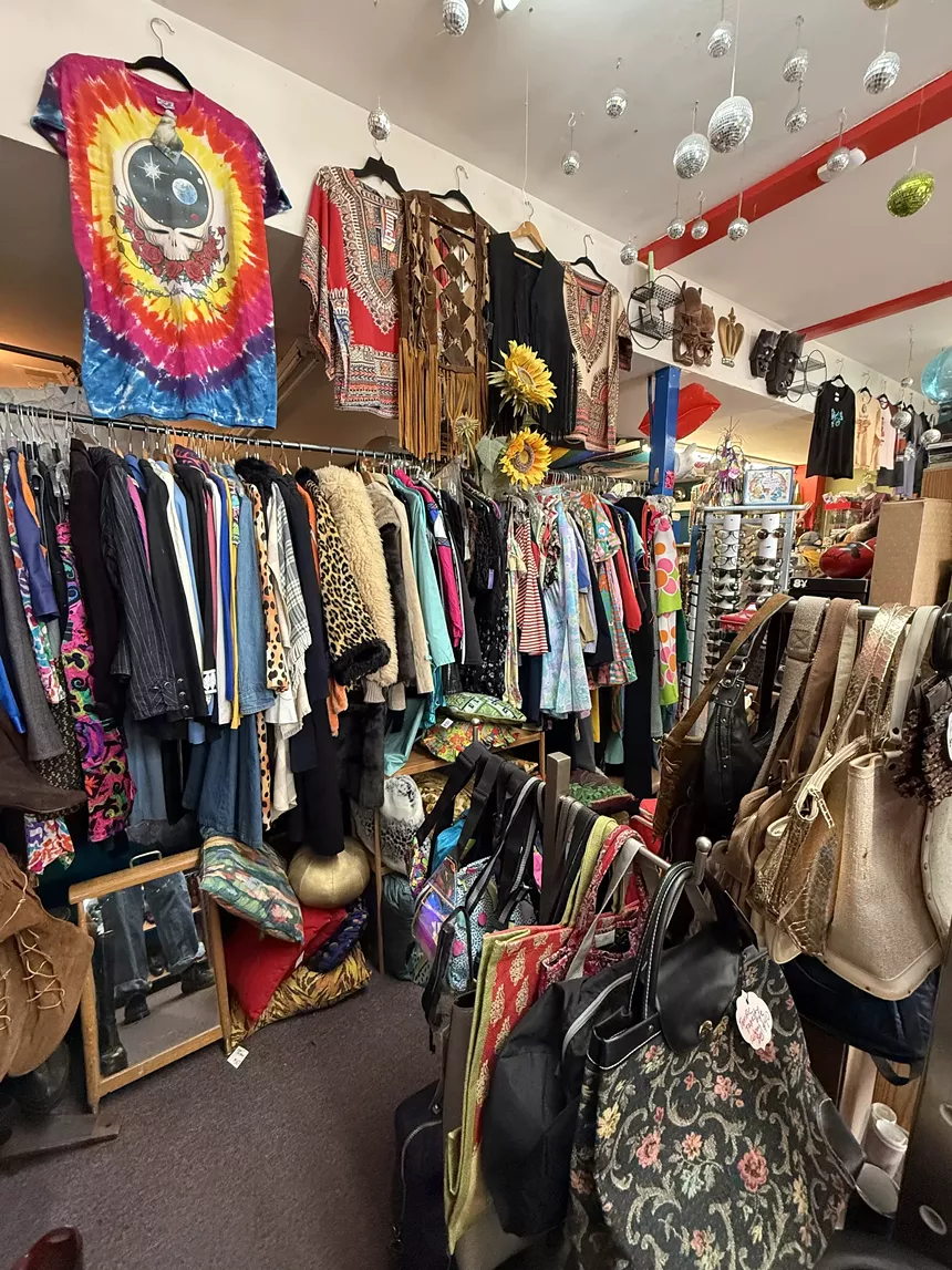 A rack of colorful clothing