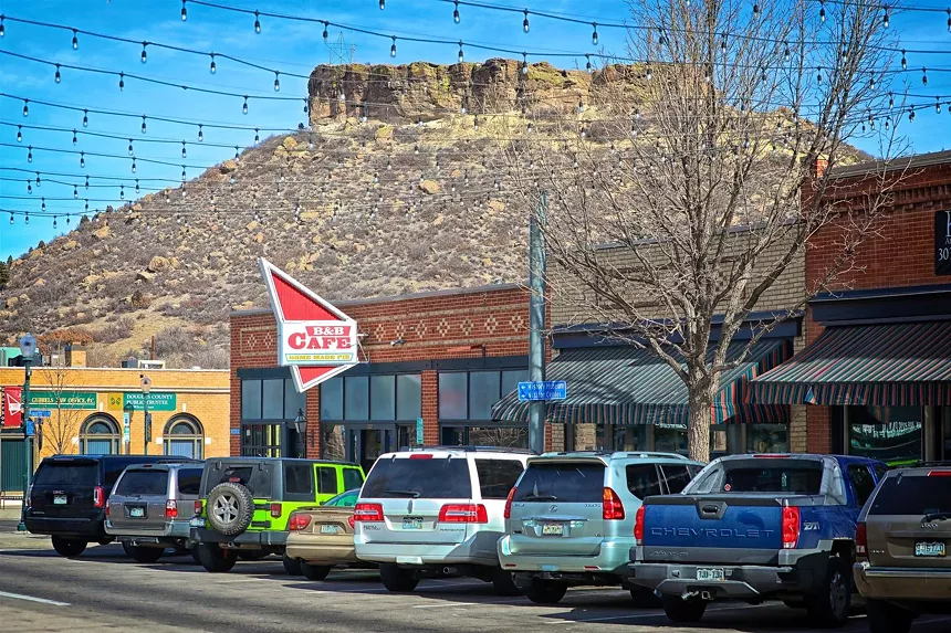downtown street with rock like castle