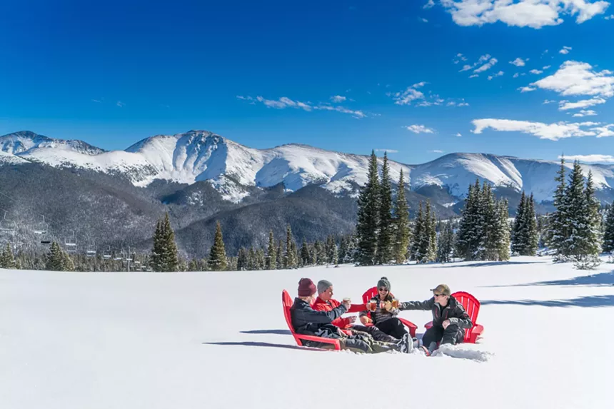 people sitting in snow