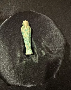 a green figure