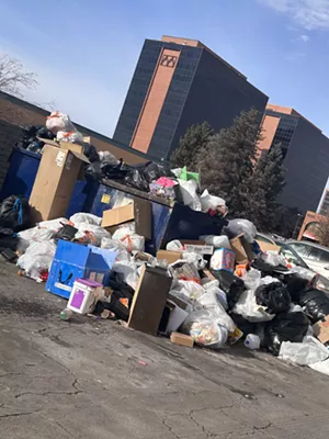 trash outside apartment building