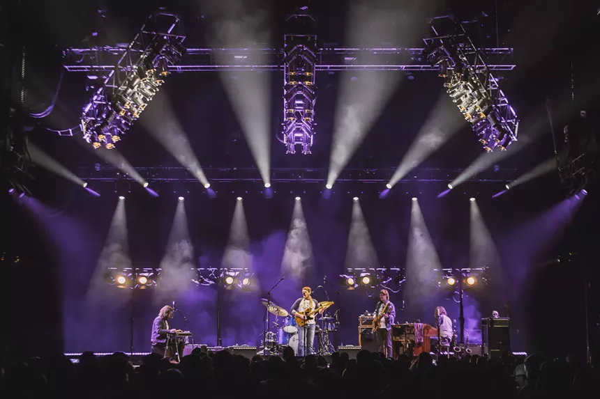 A wide camera shot of Sturgill Simpson on stage at Mission Ballroom showing his stage production.