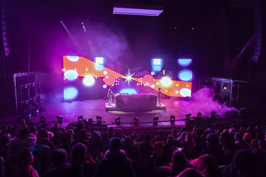 A photo showing the concert crowd and Polo & Pan on stage at Red Rocks.