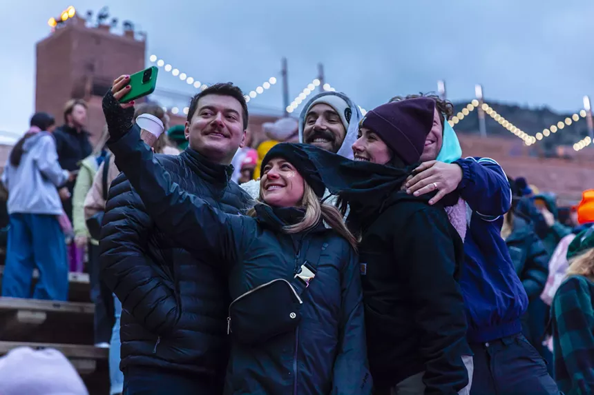 Concertgoers taking a selfie at Red Rocks.