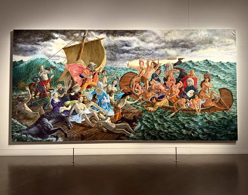 A large painting of people in the ocean