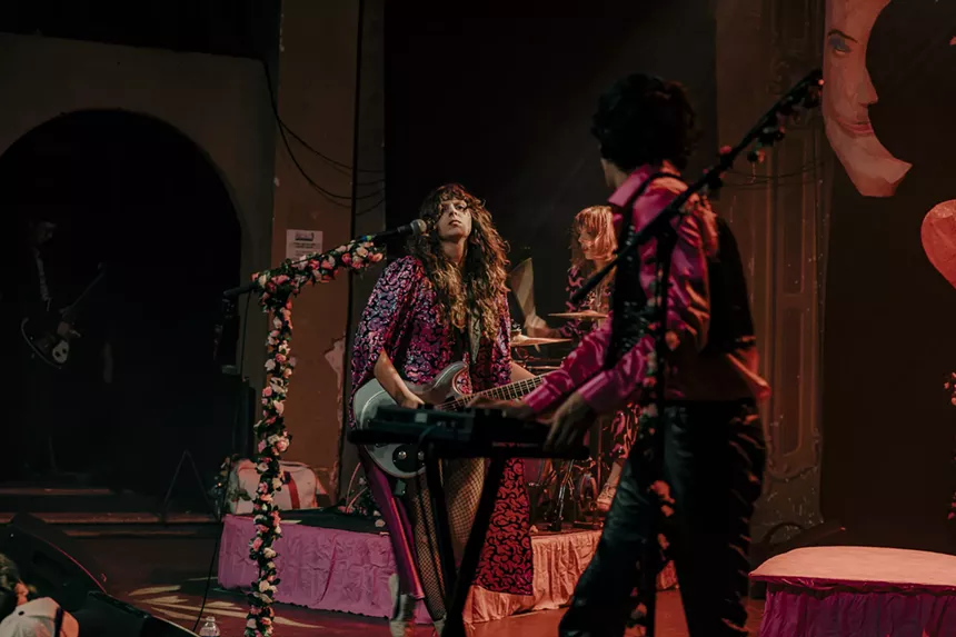 A photo showing Demi Demitro and her bandmates.