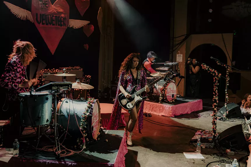 A photo showing The Velveteers performing on stage at the Bluebird Theatre.
