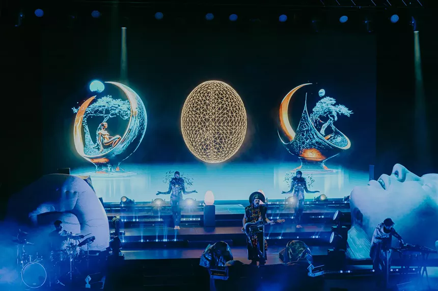 A wide shot of Empire of the Sun showing the stage visuals.