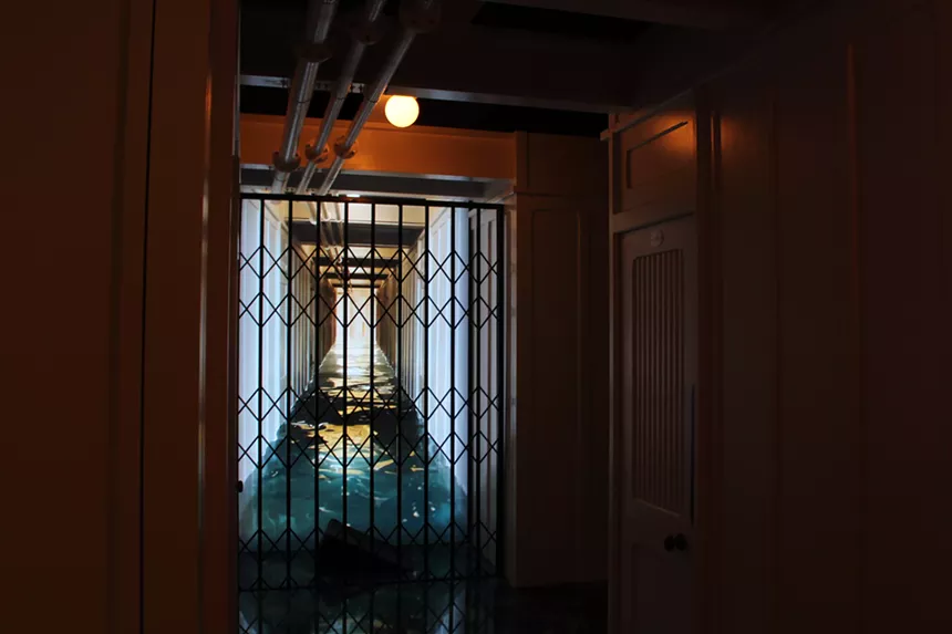 A hallway with water