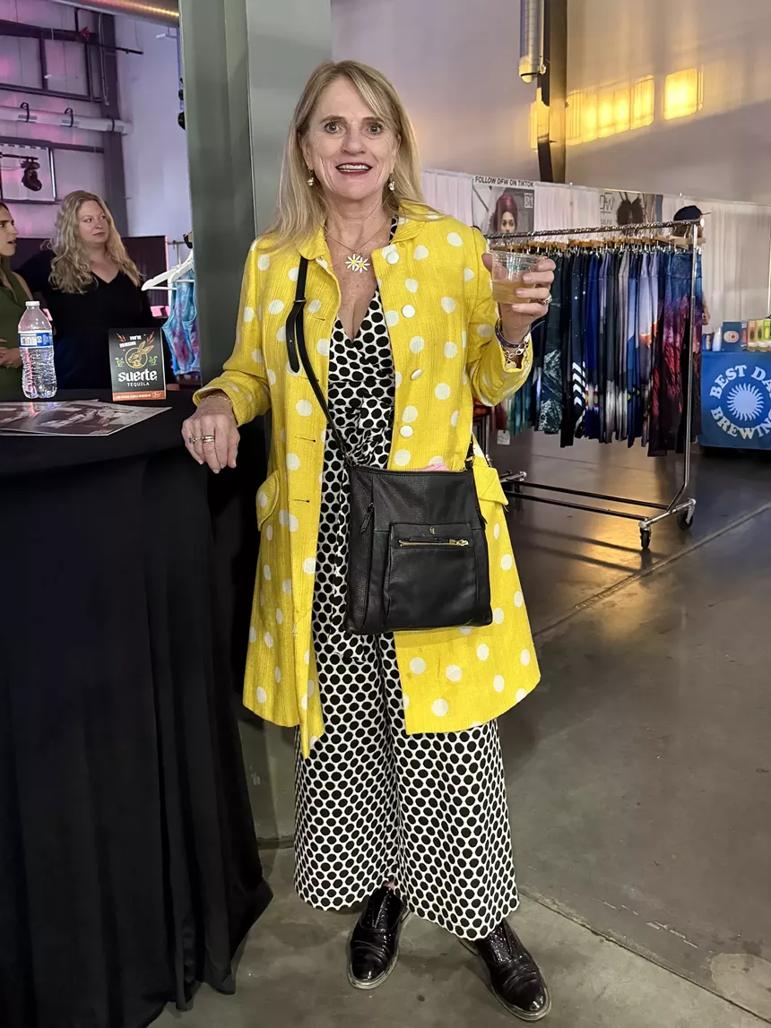 A woman in a yellow jacket
