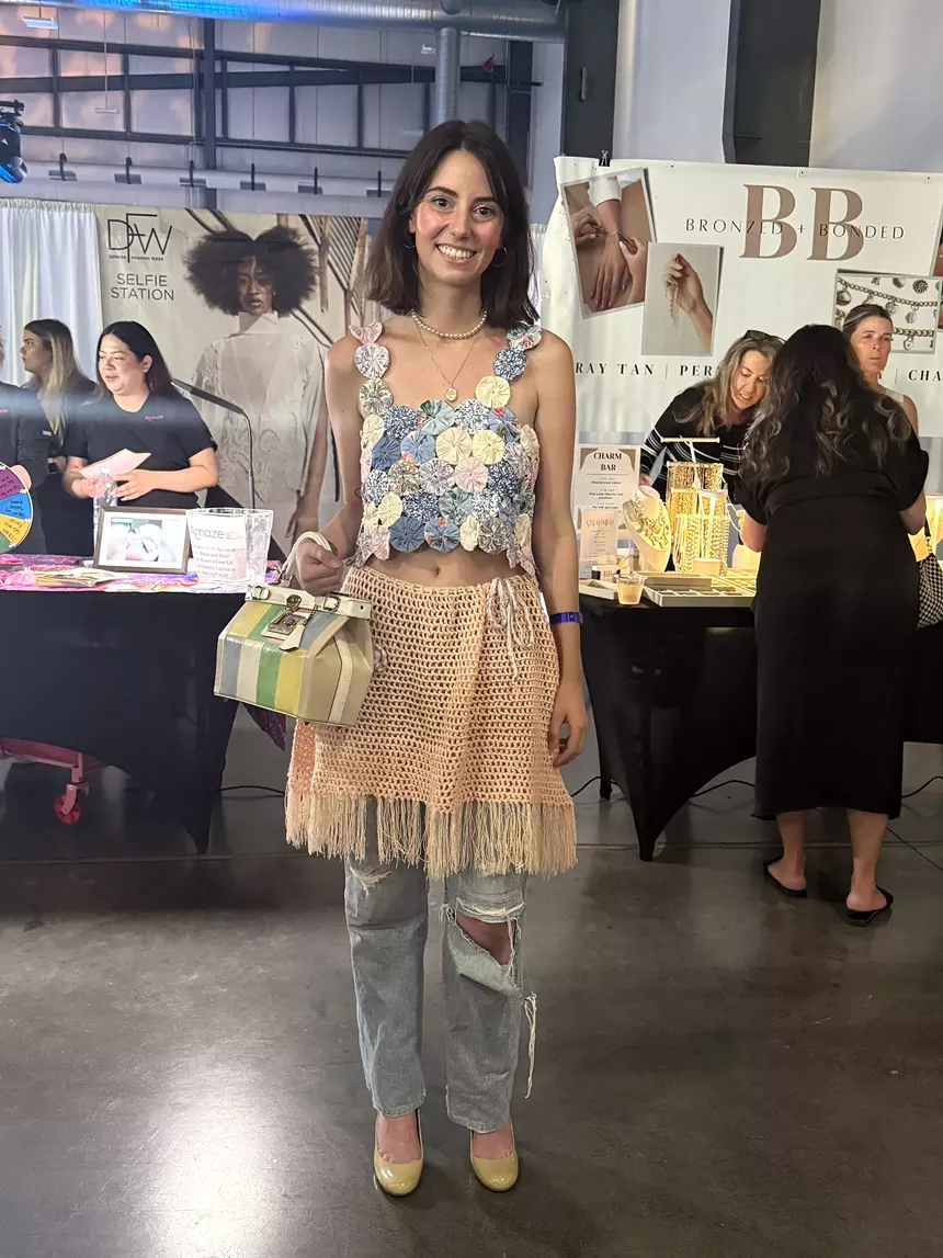 A woman in a handmade outfit