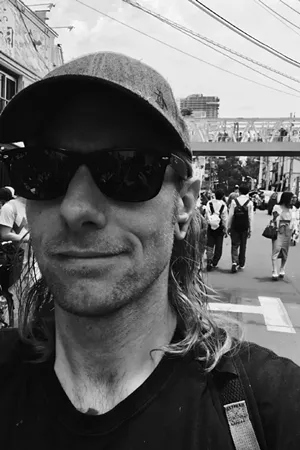 A black and white photo of a man