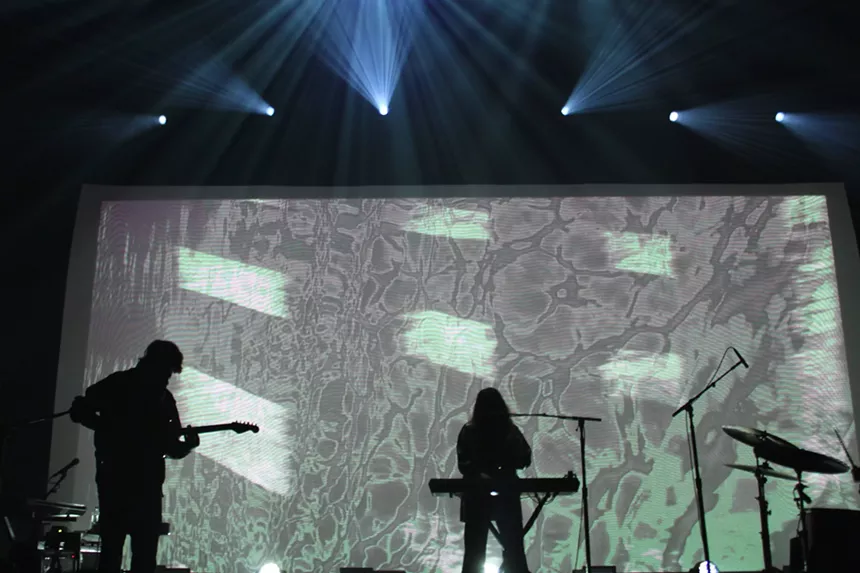 Beach House performing in Denver