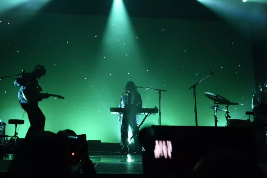 Beach House performing in Denver