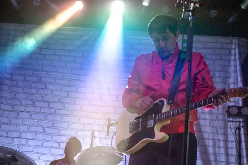 A musician playing on stage