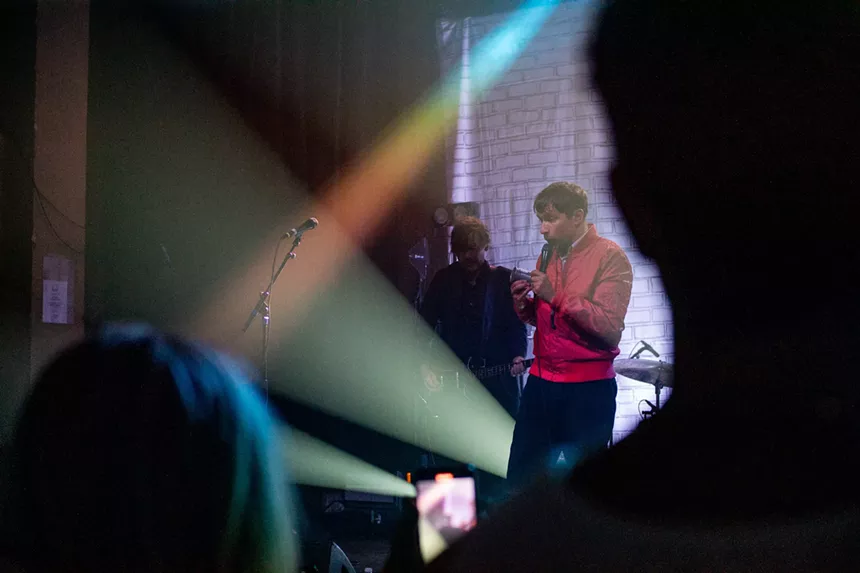 A musician playing on stage