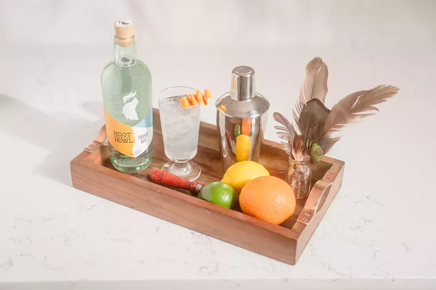 Triple sec in a cocktail basket.