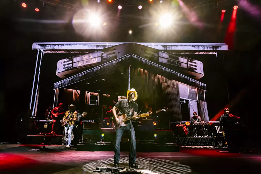 Brad Paisley performing on stage at Red Rocks for his Truck Still Works World Tour.