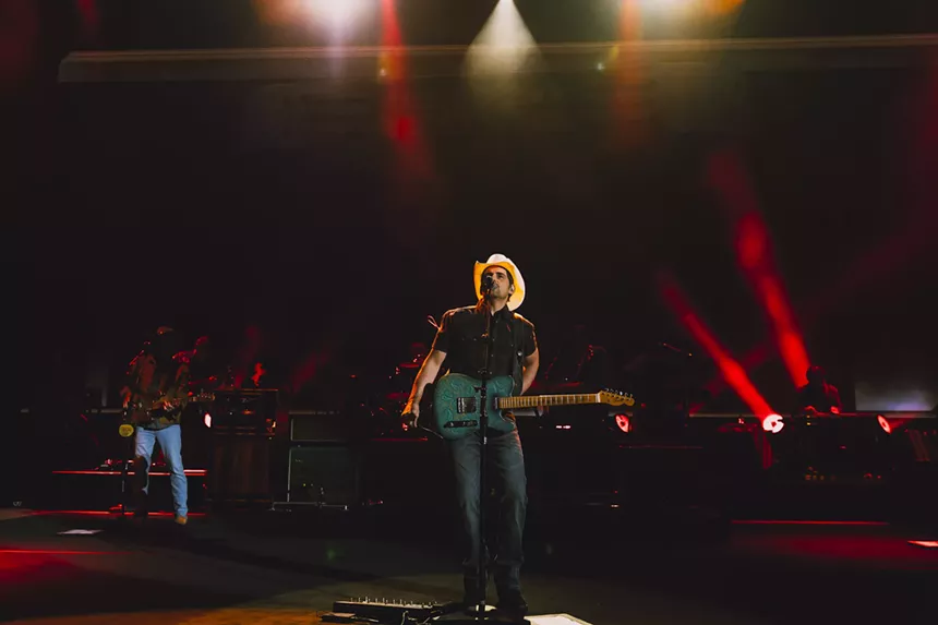 Brad Paisley performing on stage at Red Rocks for his Truck Still Works World Tour.