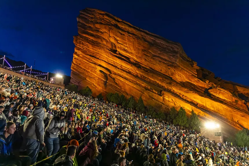 A photo showing a packed Red Rocks.
