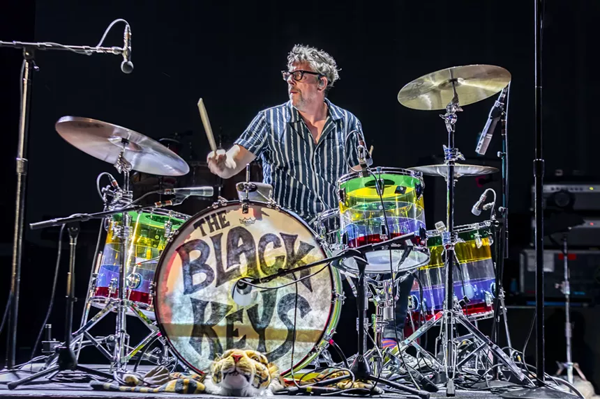 Patrick Carney, of The Black Keys, performing on stage at Red Rocks.