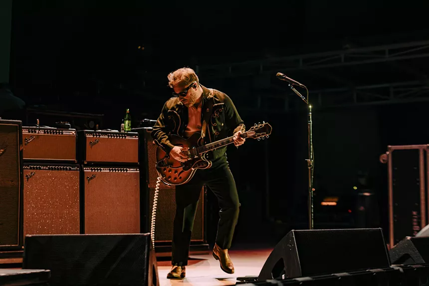 Dan Auerbach, of The Black Keys, performing on stage at Red Rocks.