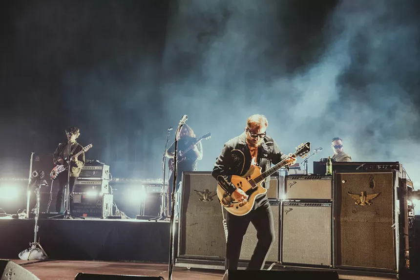 Dan Auerbach, of The Black Keys, performing on stage at Red Rocks.