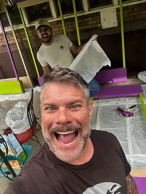 A man smiles for a selfie