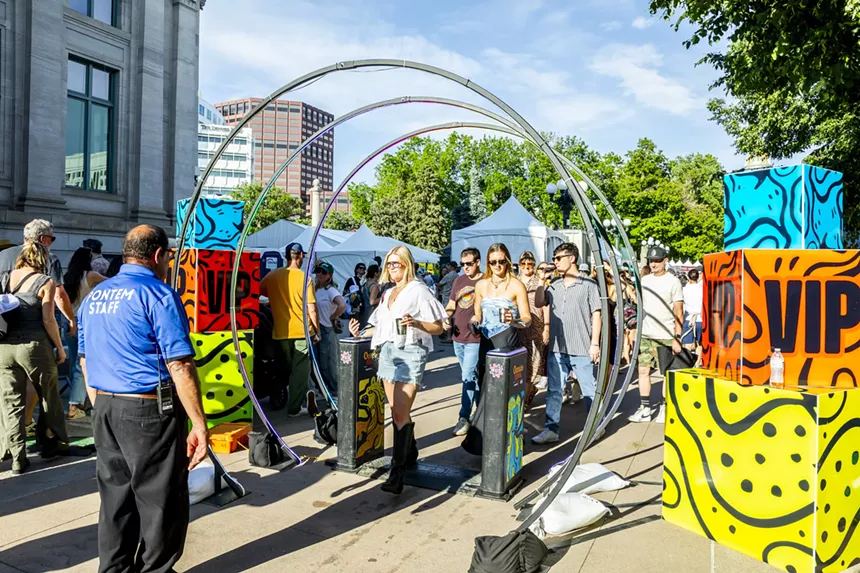 Attendees enter the VIP area at Outside Festival on Saturday.