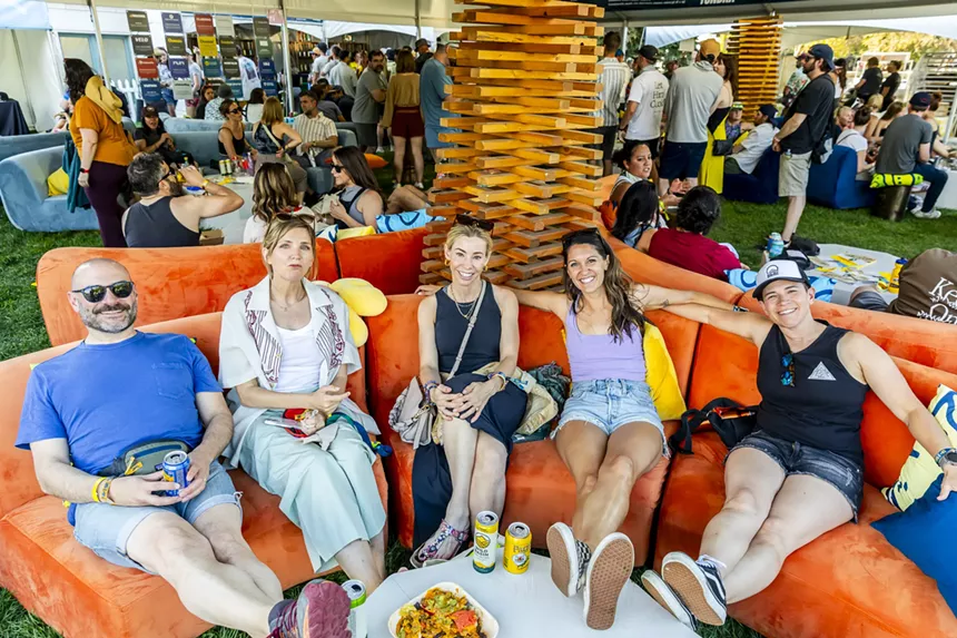 A group photo of attendees at the GA+ lounge.